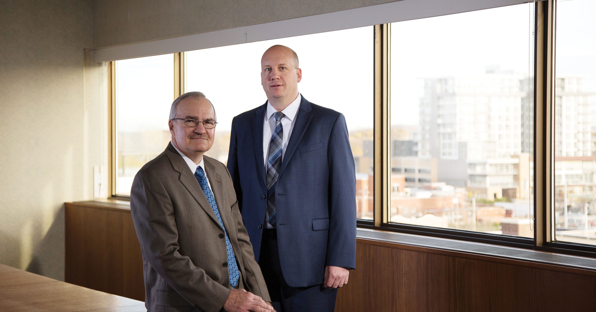 Gary J. Wolter, MGE Energy Chairman, with new MGE President and CEO, Jeffrey M. Keebler