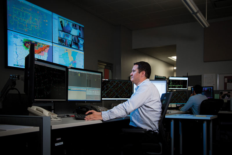 We invested in a state-of-the-art distribution management system to help us operate, maintain and optimize the function of the electric grid. MGE's Distribution Systems Operations Supervisor Ross Hewitt monitors the grid in our operations center.