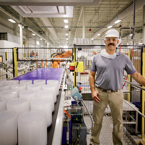 Placon Engineering Manager Jim Hart uses MGE's On Demand Savings program to monitor energy usage throughout the plastics manufacturer's production areas at its company headquarters.