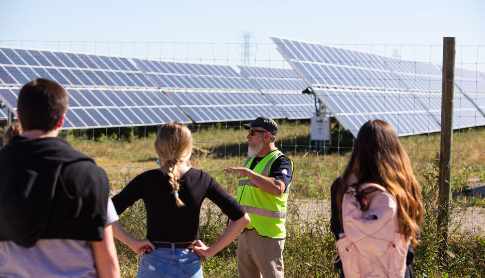 Todd Montevideo and students at O'Brien Solar Field