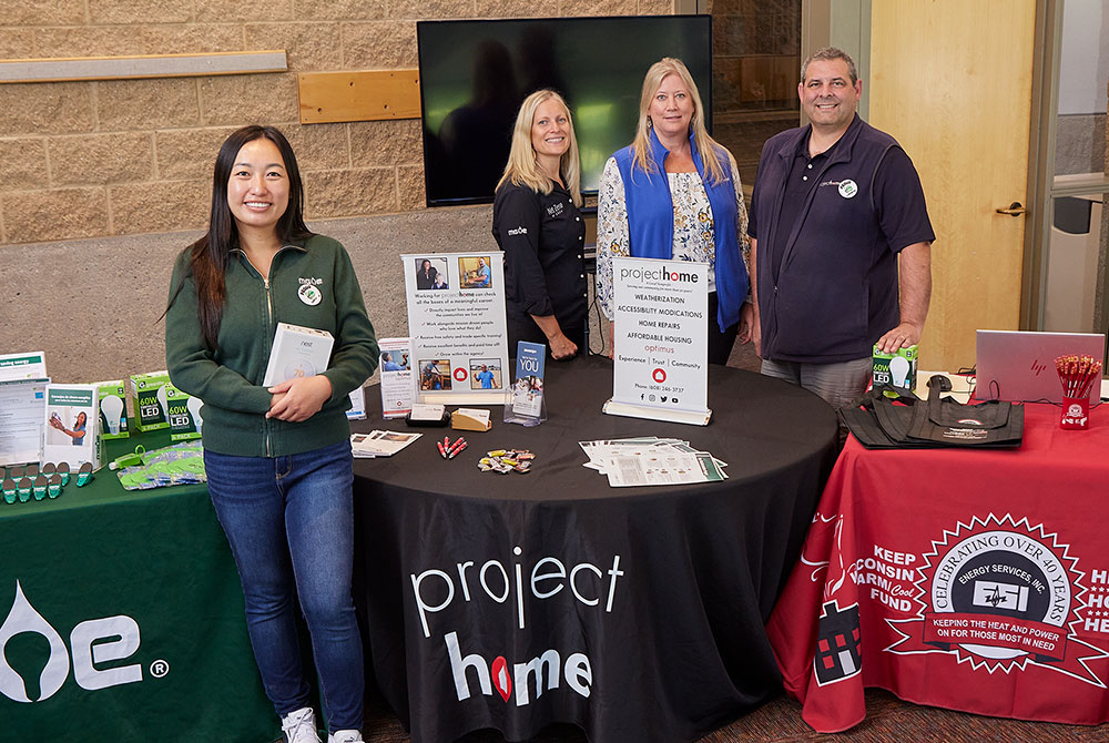 MGE Customer Engagement Manager Mai Thao (left) and MGE Residential Energy Engineer Laura Paprocki partner with Project Home and Energy Services, Inc., to host energy resource fairs for seniors.