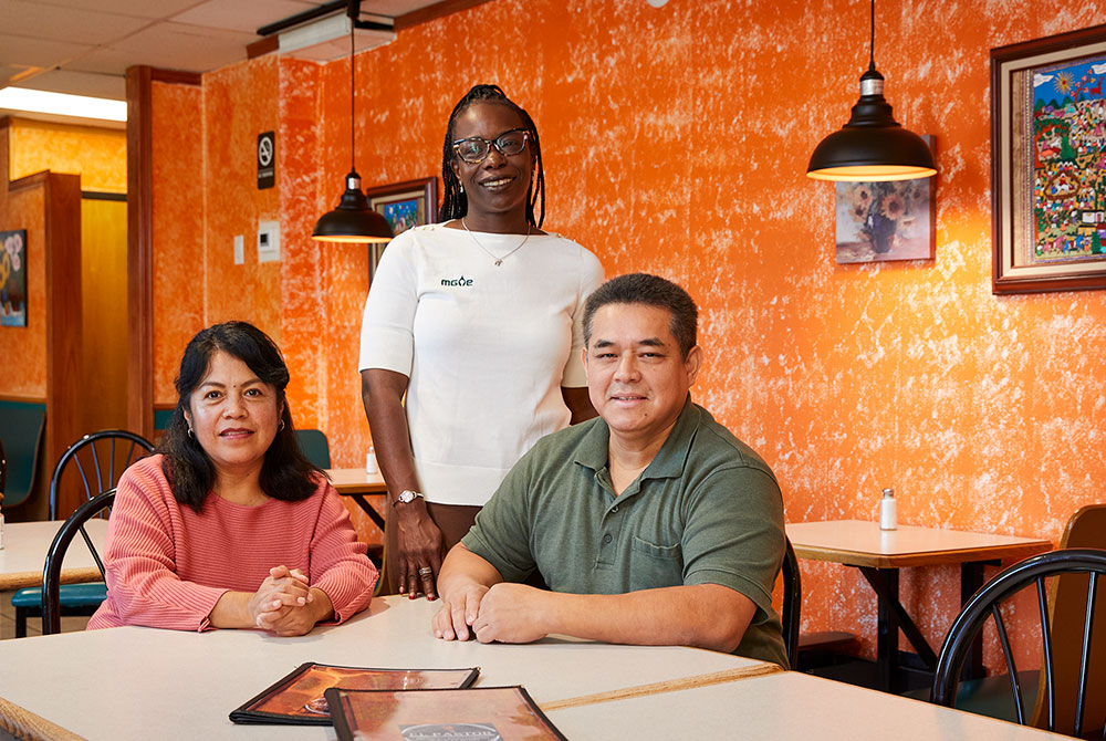 MGE’s Charlene Smith, Business Community Manager, with Rosalino “Lino” Antonio Ruiz and his wife, Maria Serrano-Miranda, at their restaurant, El Pastor Mexican Restaurant and Catering