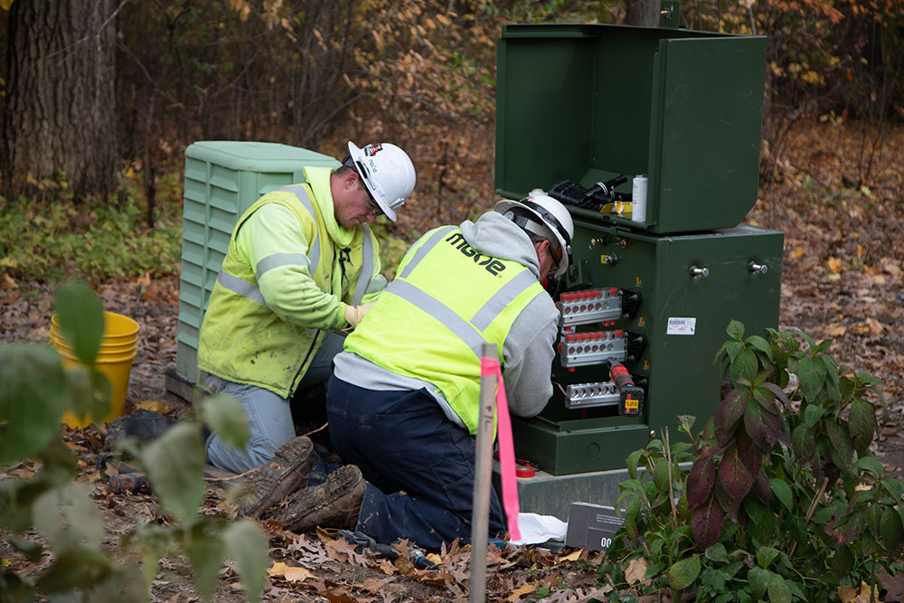 Crews install new facilities where overhead electric lines have been removed and replaced with underground lines as part of MGE’s grid modernization projects.