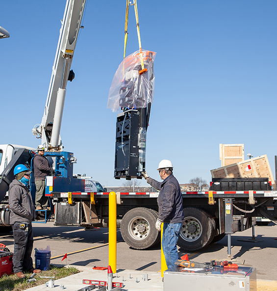 A large crane installed the fast charging station at the airport.