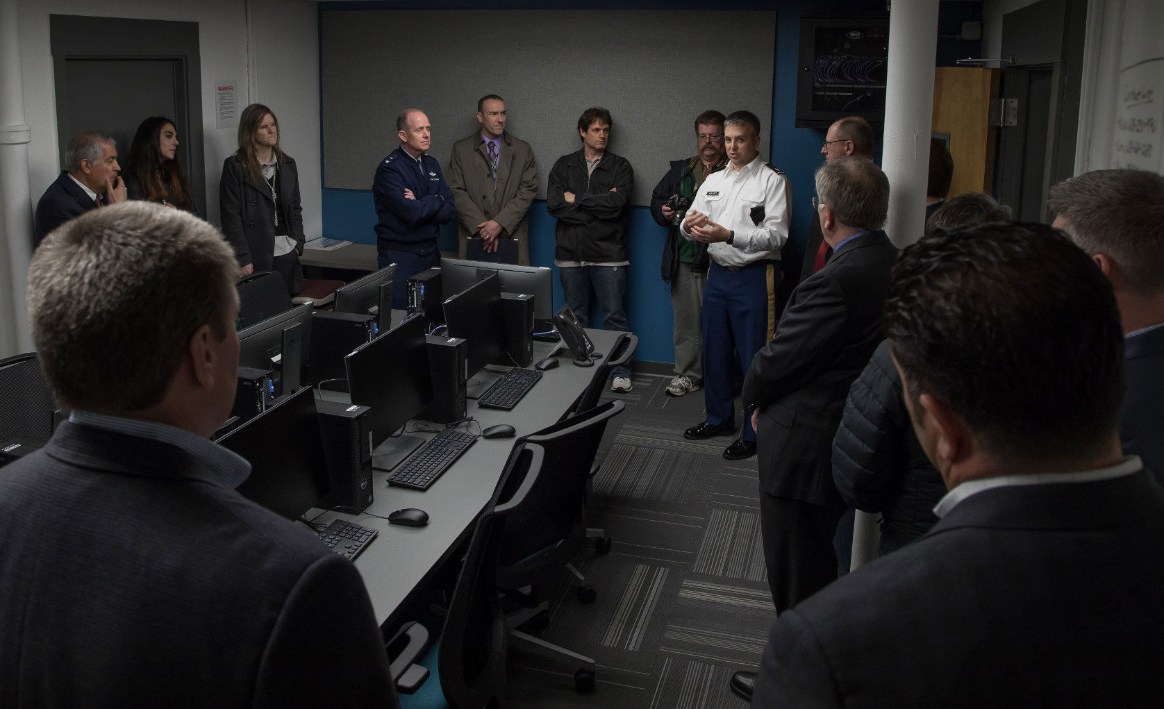 Partners in the Dark Sky exercise toured MGE's Cyber Range, a virtual environment that served as one